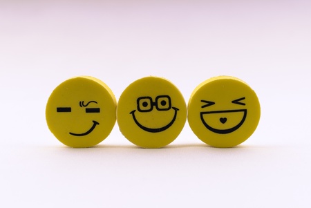 yellow erasers with smiley faces