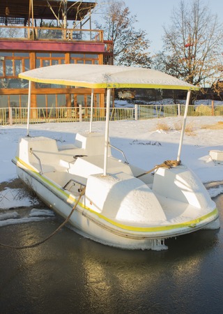 catamarans under snow in winterの写真素材