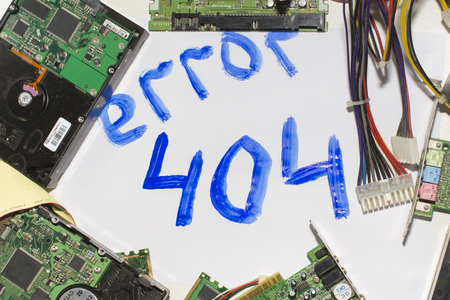 Electronic circuitry on a white background, top view, inscription error 404の写真素材