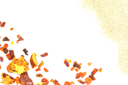 Eight different pieces of amber on a white background. Amber of various colors and structure and shapes. Transparent and opaque pieces of amber. Natural amberの写真素材