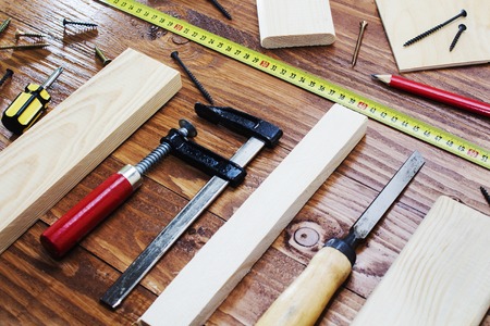 working tool carpenter ruler, chisel, pencil, sawdust and shavingsの写真素材