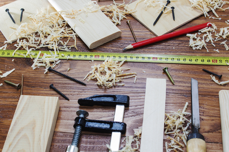 working tool carpenter ruler, chisel, pencil, sawdust and shavingsの写真素材