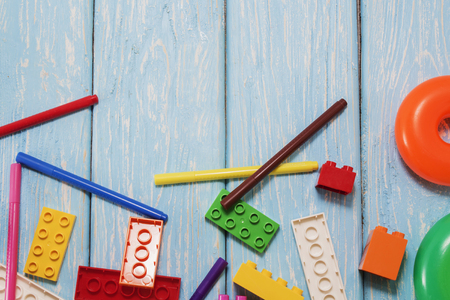 Multicolored plastic building blocks of the designer. Background of bright plastic building blocks.の写真素材
