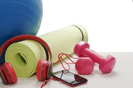 Fitness ball, dumbbells, Mat isolated on white background