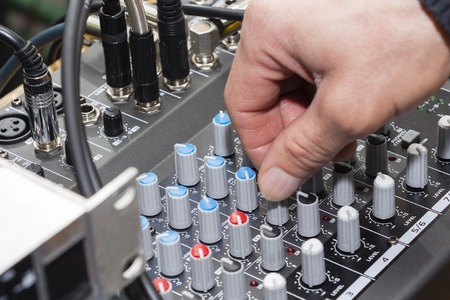 audio jack and wires connected to audio mixer, music dj equipment at concert, festival, barの写真素材