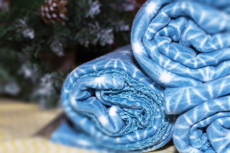 warm plaid on the background of the Christmas tree the concept of Christmas gifts.の写真素材