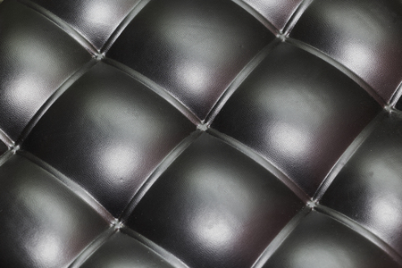 Luxurious black buttoned leather texture. Background texture.の写真素材