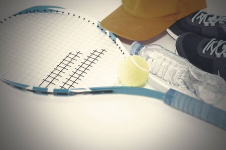 Tennis on a light background. sneakers, tennis racket, ballの写真素材