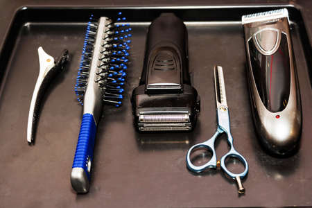 professional tools of hairdresser in black case