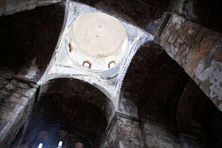 the ceiling, the arch of an old church, a dark roomの写真素材
