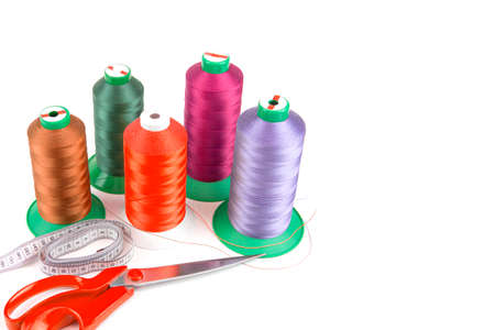 Colorful sewing thread, background, tailor-related images. On a white background