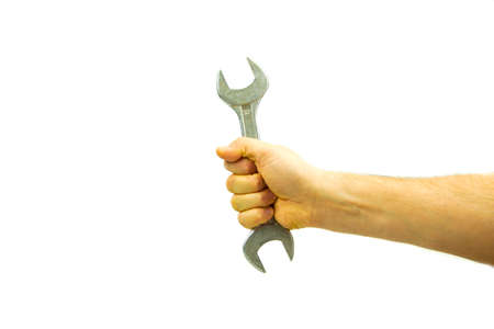 Repairing work spanner wrench tool in human hand, isolated white background