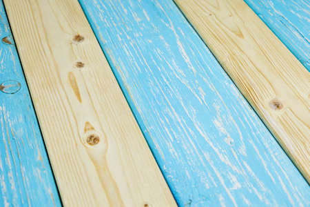 background made of natural wooden boards, boards of different colorsの写真素材