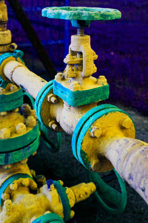 An old gas pipeline in the open air. Close-up view. The energy crisisの写真素材