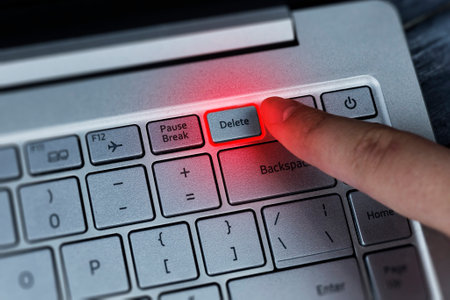 Pressing the delete button on the keyboard with your finger, the effect of red neon lighting....
