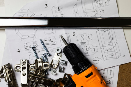 Furniture fittings. Furniture assembly hardware options and tools on a white background. Large...