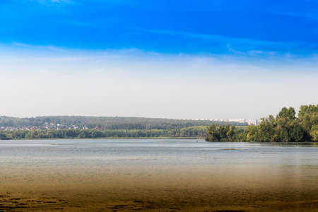 View of the lake in the afternoon. Photo taken on the shores of Lake Shershny, Chelyabinsk, Russia.