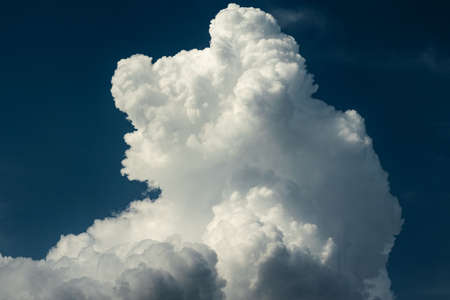 A cloud in the blue sky close-up. Photo taken in Chelyabinsk, Russia.の写真素材
