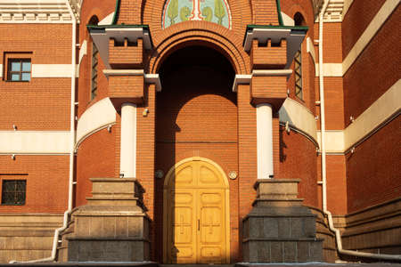 The door and part of the building of the Temple in honor of the Holy Great Martyr George the Victorious. Photo taken in Chelyabinsk, Russia.の写真素材