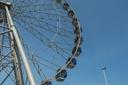 Part of the design of the Ferris wheel with booths.