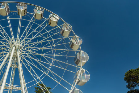 Part of the Ferris wheel against the sky.の写真素材