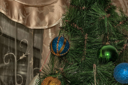 Toys hang on the New Year tree.の写真素材