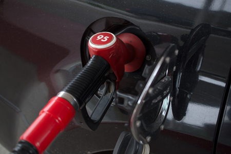 The image of the neck of the tank car with filling gun is insertedの写真素材