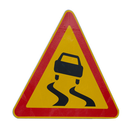 Triangular road sign on a white background.の写真素材