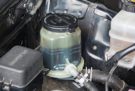 Close up look at the steering fluid reservoirの写真素材