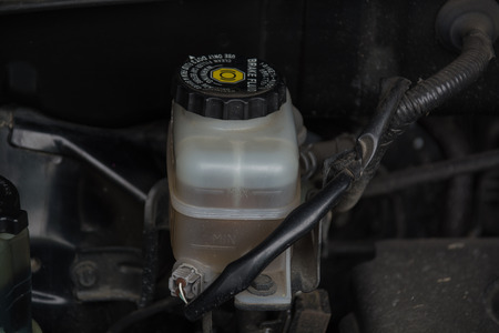 Close up look at the brake fluid reservoirの写真素材