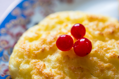 Round cookie with cranberries atop. Dietary product.の写真素材