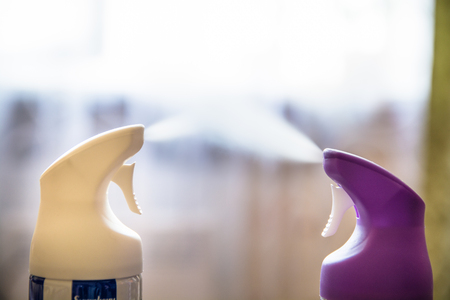Two cylinder of air freshener in a row. Air fresheners in action.の写真素材