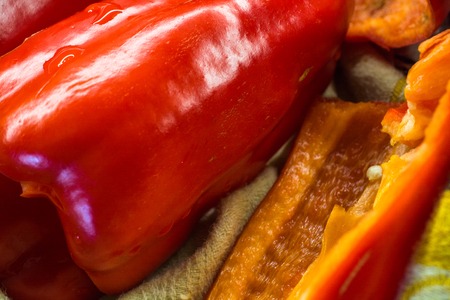 Fresh red peppers close up. Slice of bell pepper.の写真素材