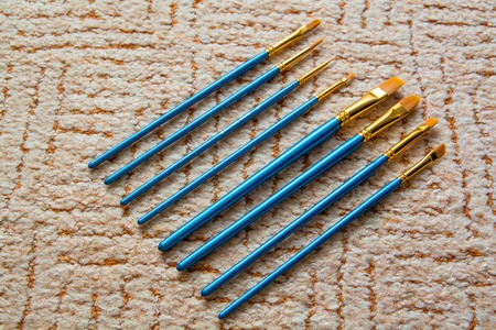 Set of paintbrushes. Thin brushes with blue handle.の写真素材