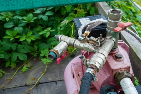 Electric water pump with fittings. Water system valves, pump motorの写真素材