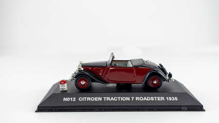 reduced model of a collectible car on a white background