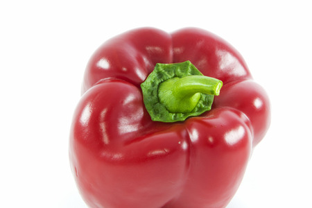 Red bell peppers or capsicum isolated on white backgroundの写真素材