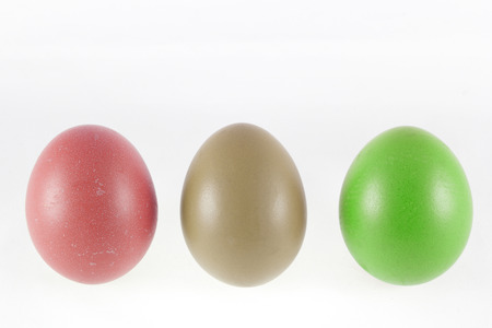 Photo of  three colored Easter Eggs on white backgroundの写真素材