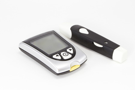 Illustration of a blood glucose measuring device on a white backgroundの写真素材