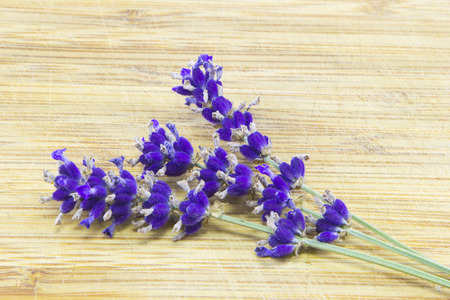 Lavender flowers on a vintage wooden backgroundの写真素材