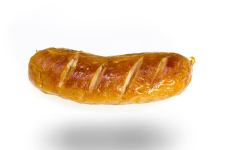 Delicious Cooked sausage isolated on white backgroundの写真素材