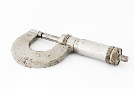 Picture of old micrometer- measuring instrument,accurate metering,calibration tool-  isolated on...