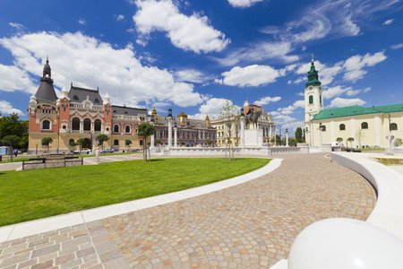 Union square (Piata Unirii) Oradea, Romania, cityscape with beautiful cloudsの写真素材