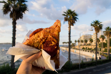 Enjoying street food in the harbor.の写真素材