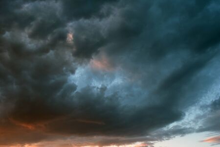 Storm clouds at sunset in bright colors