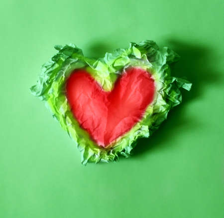 Photo crumpled paper in the shape of a heart