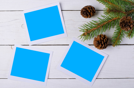 Christmas cards for your photos and inscriptions on the wooden background. Christmas decoration: fir...