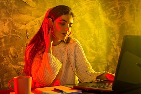 Business woman working on a laptop, stressful situation. Woman workaholic tired of excessive work.