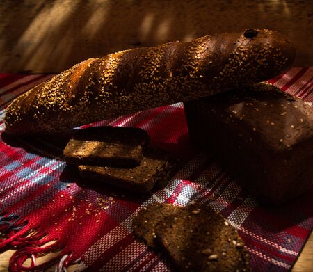 Gray bread with garlic on a tablecloth