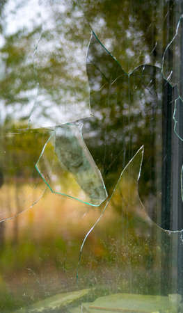 Old window with broken glass
